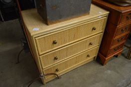 A bamboo and rattan bedroom chest.