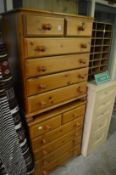 A pair of modern pine chest of drawers.