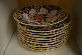 Imari decorated plates and a bowl.