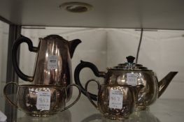 A plated four piece tea service.