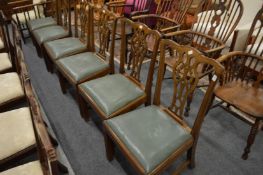 A set of six George III style mahogany dining chairs with drop-in seats.