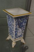 A Herend porcelain tapering square shaped vase on moulded feet.