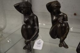 Tom Greenshields, Rosie holding her Hair 1991, bronze resin, a pair.