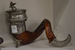 A rams horn snuff mull with plated mounts.