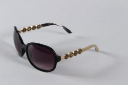 A PAIR OF LOUIS VUITTON SUNGLASSES.