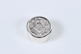 A SILVR MASONIC PILL BOX.