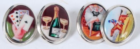 A PAIR OF SILVER ENAMEL FOUR VICE CUFFLINKS.
