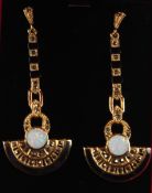 A PAIR OF SILVER AND GOLD PLATED ONYX OPAL DECO EARRINGS.