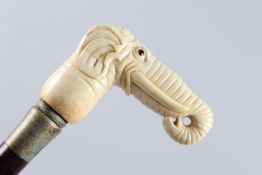 A WALKING STICK WITH A CARVED BONE HANDLE, ELEPHANT.