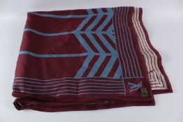 A LARGE LOUIS VUITTON BLANKET in original box.