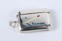 A SILVER ENAMEL VESTA (match to strike).