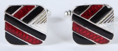 A PAIR OF SILVER RED AND BLACK DECO STYLE CUFFLINKS.