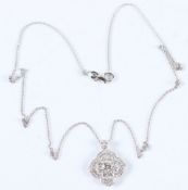 A GOOD 18CT WHITE GOLD AND DIAMOND PENDANT AND CHAIN.