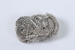 A SILVER PLATED COILED SNAKE VESTA.