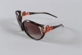 A PAIR OF ROBERTO CAVALLI SUNGLASSES.