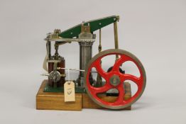 A MODEL OF A PARALLEL MOTION BEAM ENGINE with variable oscillating valve gear. 42cms x 43cms.