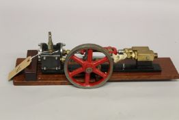 A BOILER FEED PUMP with slide valve. 52cms x 13cms.