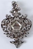 A SUPERB DIAMOND BROOCH PENDANT in original box.