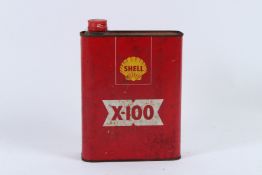 A CAN OF SHELL X-100 OIL.
