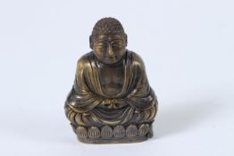 A BRASS BUDDHA VESTA.
