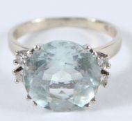 A LARGE AQUAMARINE RING.