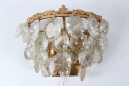 AN ORMOLU AND CUT GLASS TWIN LIGHT WALL APPLIQUE. 26cms wide x 16cms high.