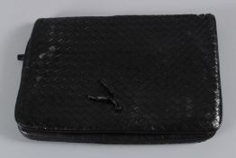 A BOTTEGA VENETA BLACK SOFT LEATHER BAG. 30cms long. Sold with Authentication Certificate.