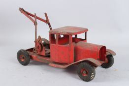 A TINPLATE TOW TRUCK. 40cms long
