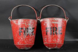 TWO RED FIRE BUCKETS. 30cms high.