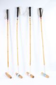 FOUR POLO STICKS.