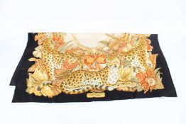 A SALVATORE FERRAGAMO FLORAL TIGER DESIGN SCARF, in original box.