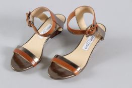 A PAIR OF JIMMY CHOO SLIP-ON SHOES. Size 38.