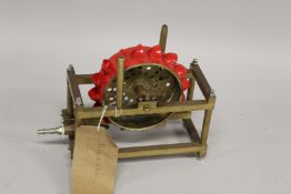 A MODEL OF A STEAM OPERATED PELTON WHEEL. 21cms x 25cms.