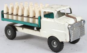 A TRI-ANG WHITE MILK TRUCK. 34cms long.