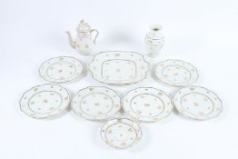 A HEREND PORCELAIN TEA SET, teapot, various saucers, cake plate, six plates.