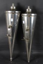 TWO CHROME FIRE EXTINGUISHERS.
