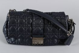 A CHRISTIAN DIOR SOFT BLUE LEATHER BAG No. 16-BO-0150, with leather and chrome strap. 34cms long,