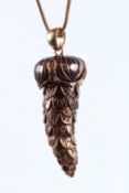 KENNETH LANE, A LARGE ACORN PENDANT, Signed.