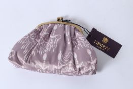 A LADIES' LIBERTY OF LONDON EVENING BAG , unused, in original box.