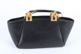 A SALVATORE FERRAGAMO BLACK LEATHER BAG. 32cms high.