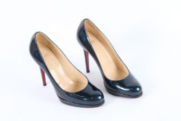 CHRISTIAN LOUBOUTIN BLUE PATENT SHOES.