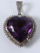 A SILVER 37.64 HEART AMETHYST 1.83CT DIAMOND PENDANT.