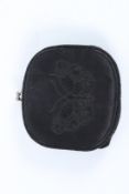 A BOTTEGA VENETA BLACK SILK BUTTERFLY PURSE. 13cms.