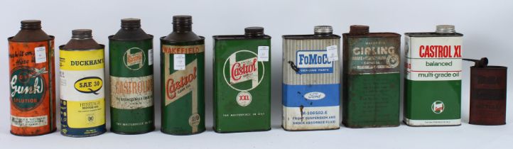 EIGHT VINTAGE OIL CANS, Guab, Fomoco, Castrol, Duckhams, two with oil.