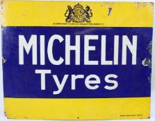 A VINTAGE BLUE AND YELLOW MICHELIN TYRES ENAMEL SIGN.