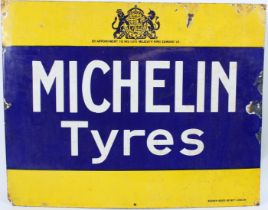 A VINTAGE BLUE AND YELLOW MICHELIN TYRES ENAMEL SIGN.