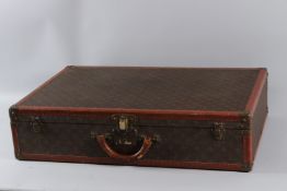 A LOUIS VUITTON SUITCASE No. 4813. 75cms long x 50cms wide x 17cms deep.