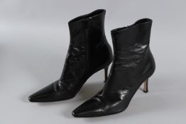 A PAIR OF GINA BLACK BOOTS. Size 6x.