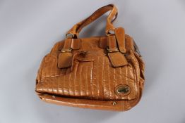 A CHLOE TAN SOFT LEATHER BAG. 40cms high.