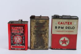 THREE VINTAGE OIL CANS, Marvel Mystery Oil, Mobil and Caltex (3).